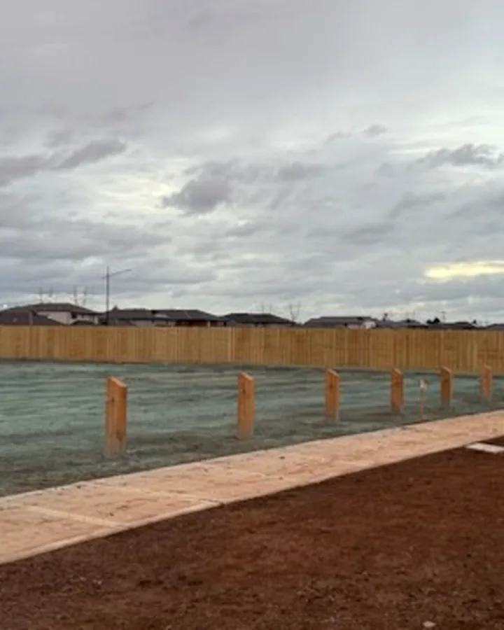 Timber bollards and rope installed around landscaped public open space